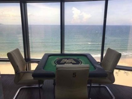 Poker table at the window with a seaview