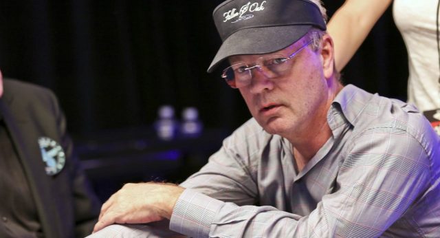 Bobby Baldwin playing poker with a black cap