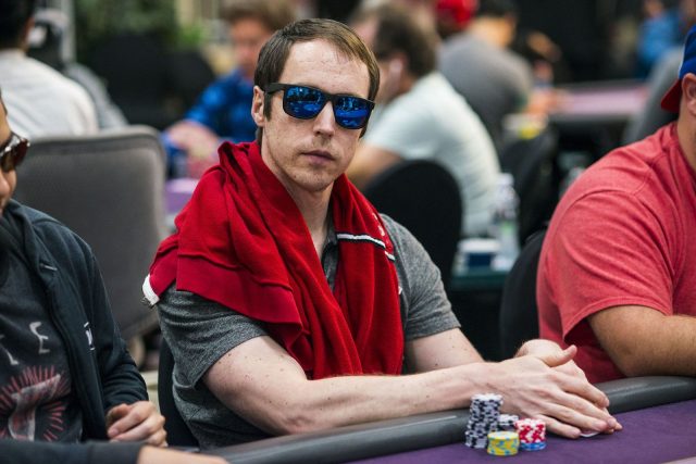 Jason DeWitt playing poker with sunglasses
