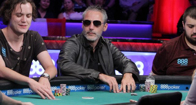 Damian Salas playing poker wearing sunglasses
